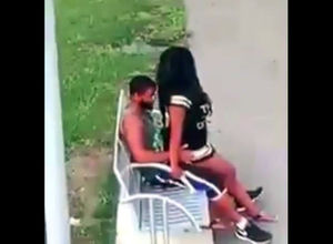 Ebony duo penetrates on park bench not