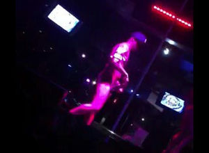 Dark-hued boy stripper dancing at go